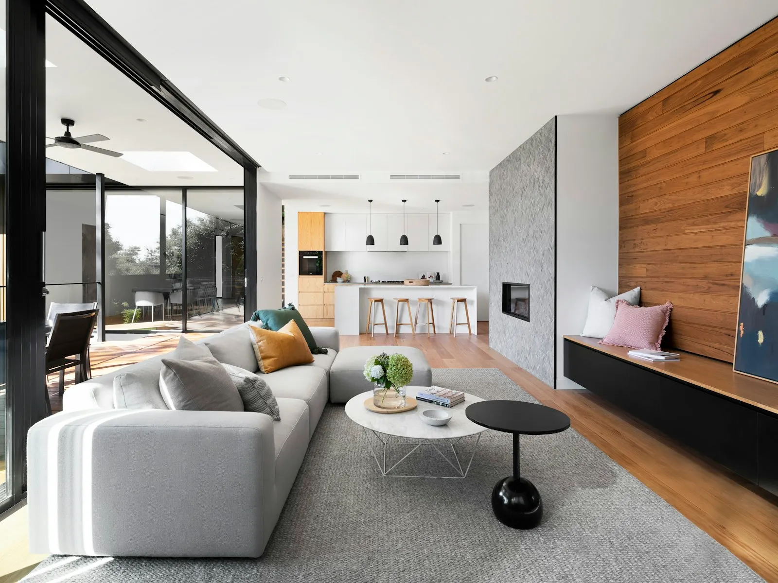 A calm contemporary living room with tailored furniture