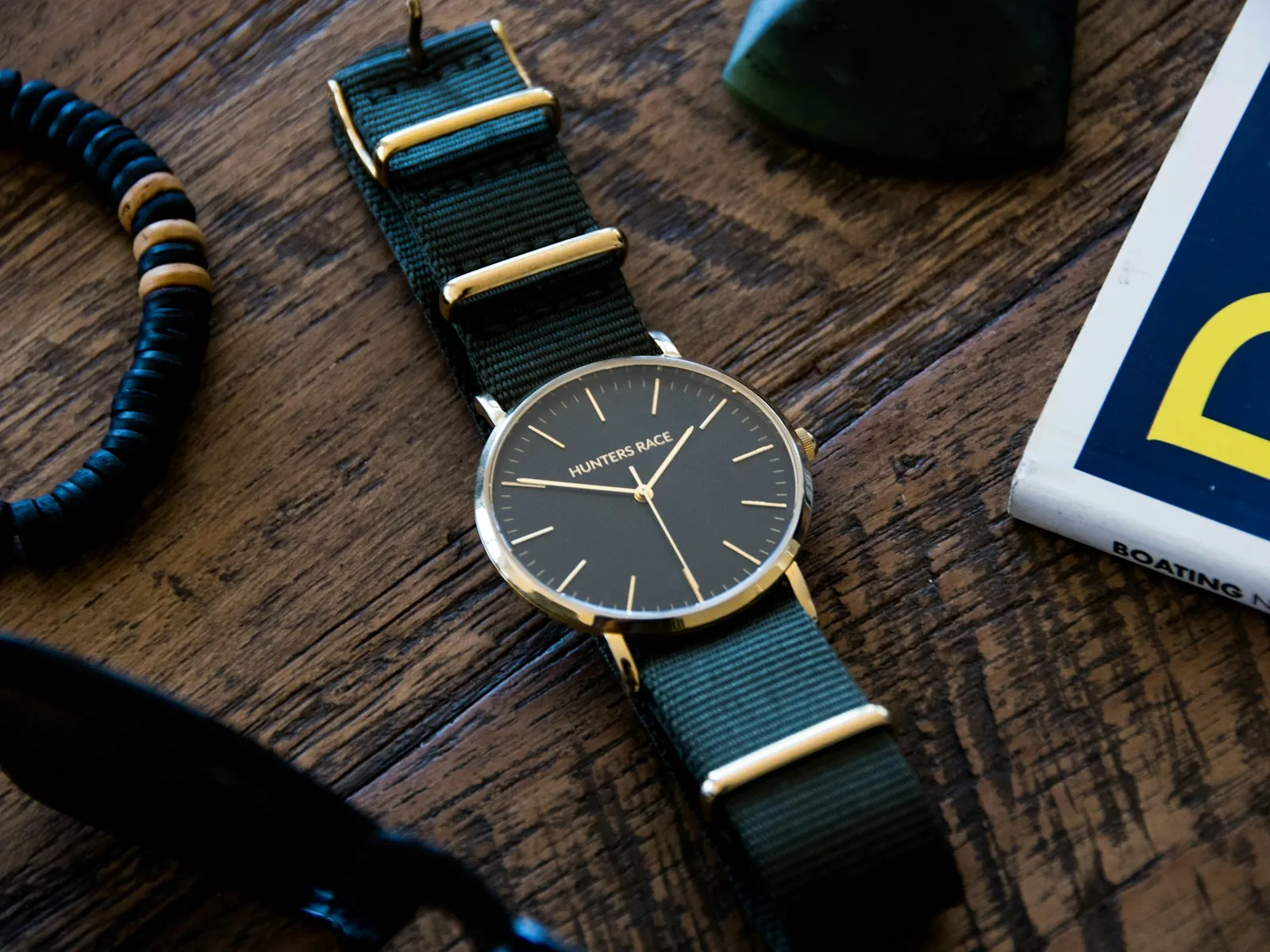 A close mechanical watch detail with a leather strap